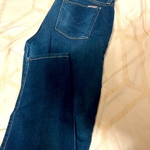 Worn Hudson jeans dark denim relax fit due to wear